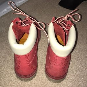 Red and white timberlands: size 10 in women’s